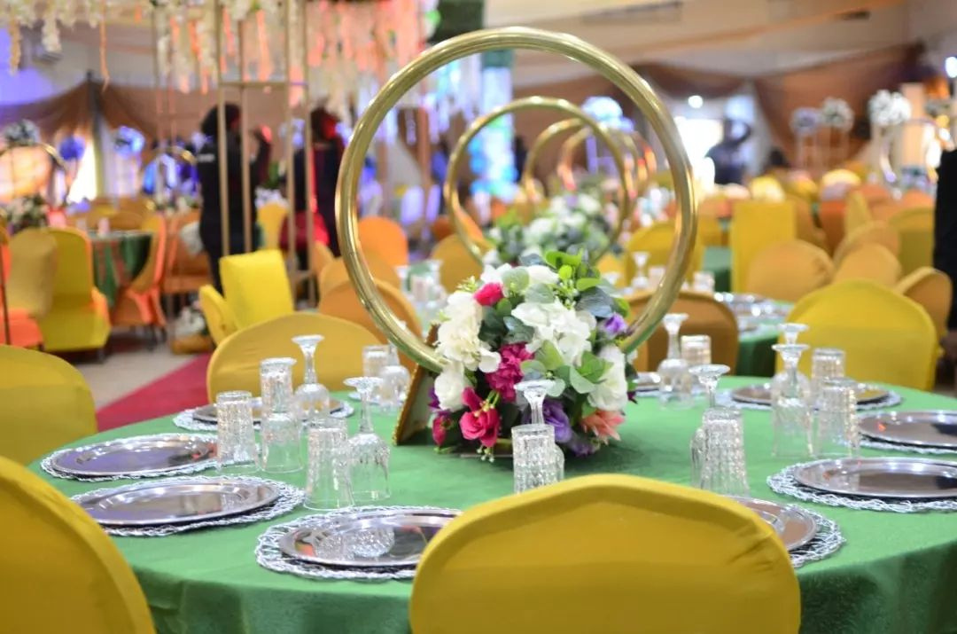 Emerald green and gold themed event hall in Abuja, Nigeria