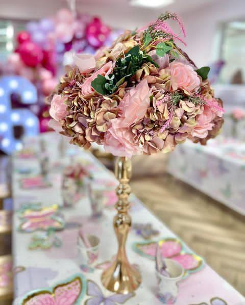 Pink butterfly themed kids' birthday party centerpiece in Lagos, Nigeria