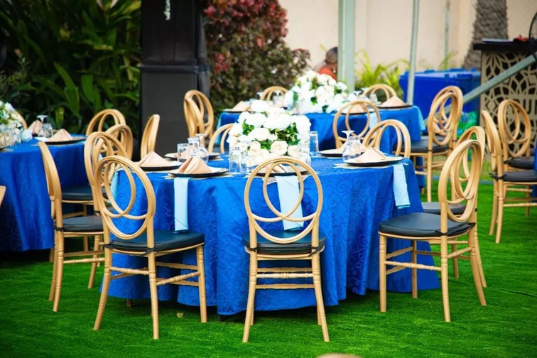 Cobalt blue outdoor garden event setting with elegant table decor, Lagos